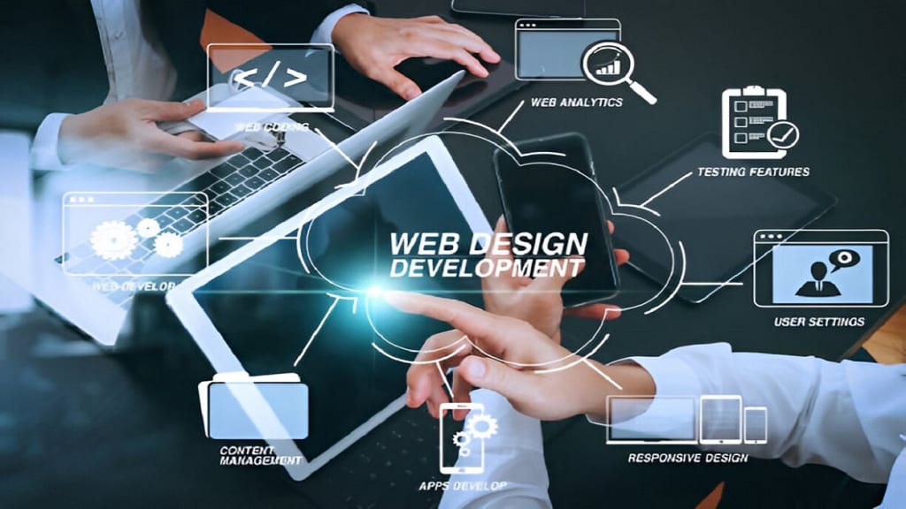 web design and development concept showing professionals using laptops and tablets with digital interface icons.